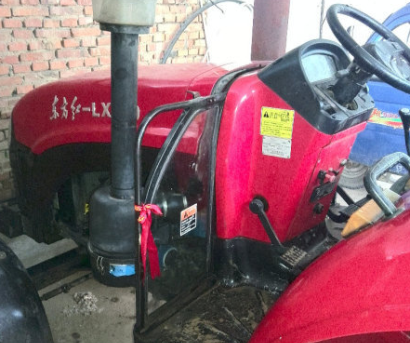 東方紅LX950拖拉機(jī)帶雙開元農(nóng)具
